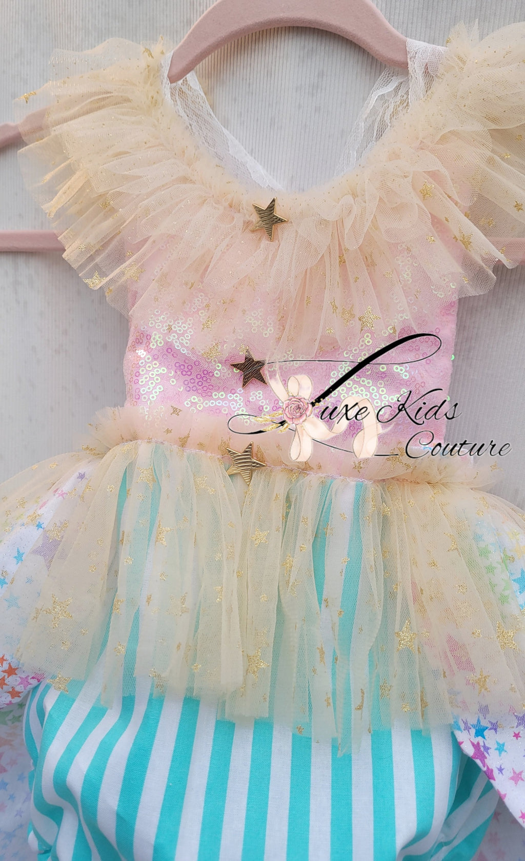 Whimsical Clown Romper in pastel colors