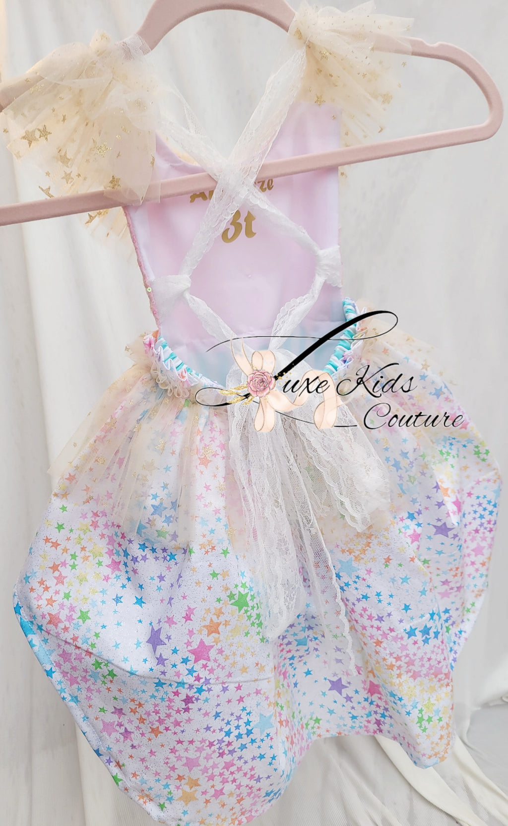 Whimsical Clown Romper in pastel colors