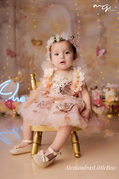 Sparkly Butterfly Deluxe Couture romper in blush and peach tones